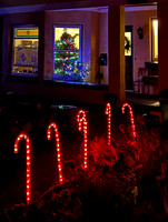 Candy canes and lit tree - seasonal lights and stained glass